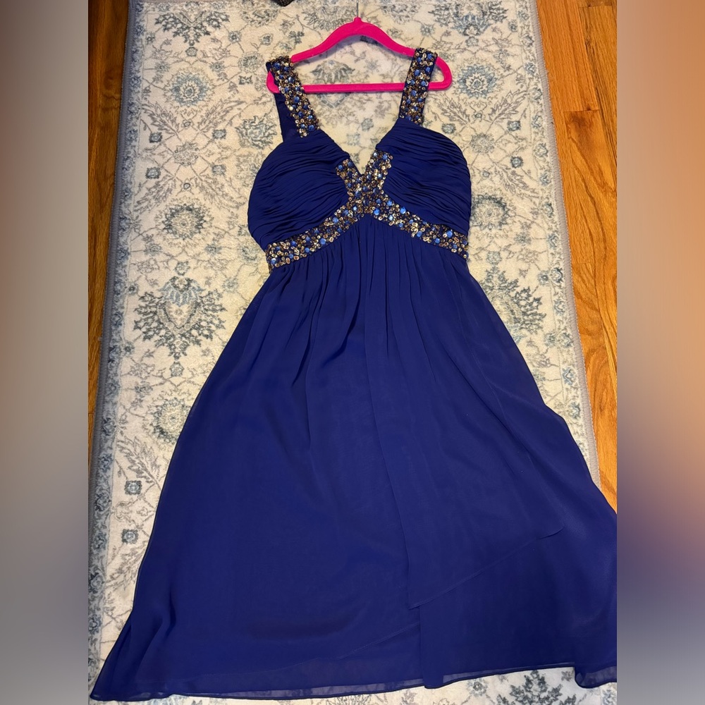 Cache dress, blue. Used once but in great condition. Size 2. Very pretty.